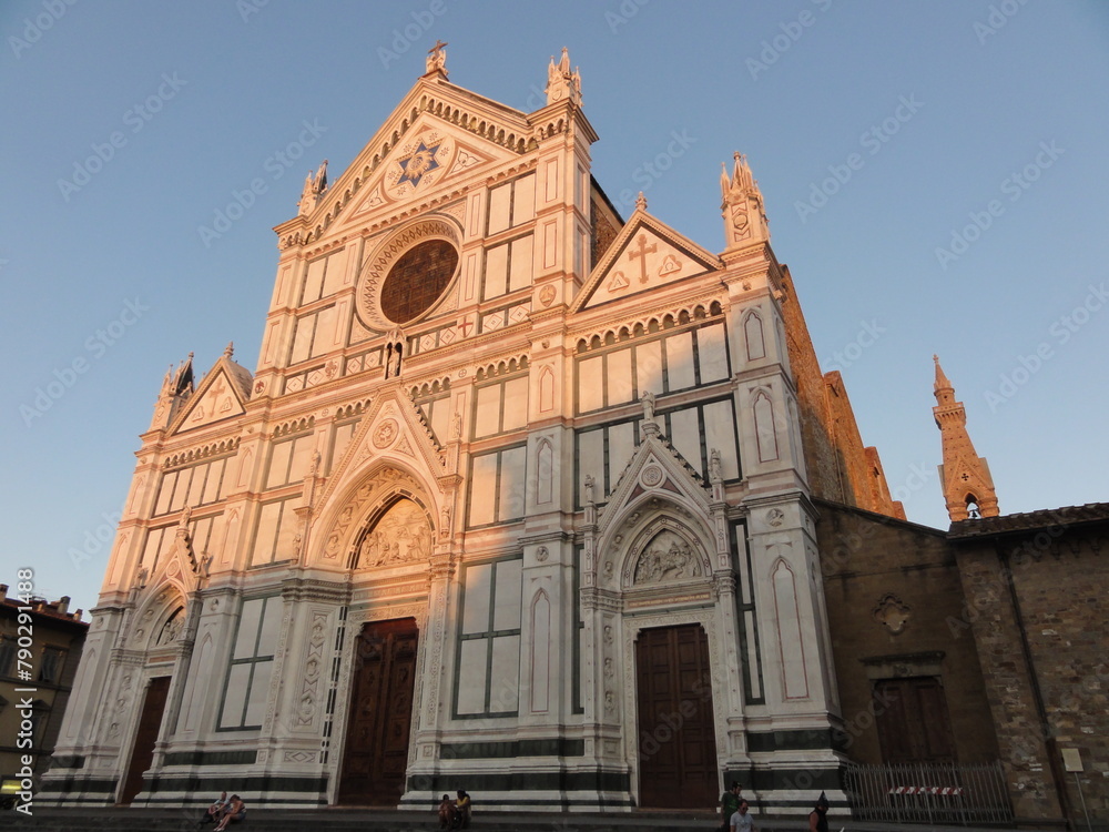 A cathedral lit by the setting sun in Florence, Italy