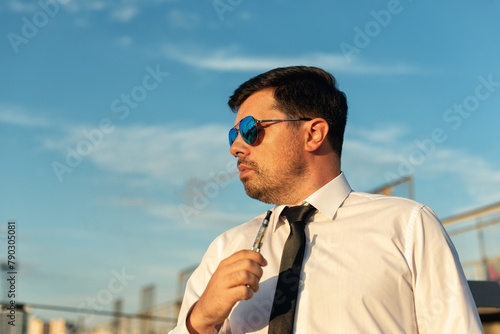 Young male businessman on the street
