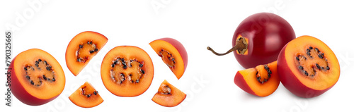 Fresh tamarillo fruit slices with leaves isolated on white background. Top view. Flat lay. Set or collection photo