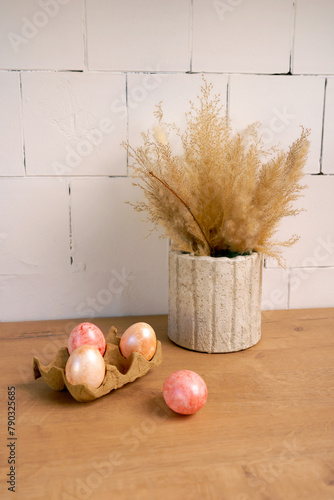 natural colored Easter eggs are lying on the kitchen table, preparation for Easter, an element of Easter decor, Spring easter composition © Маргарита Трушина