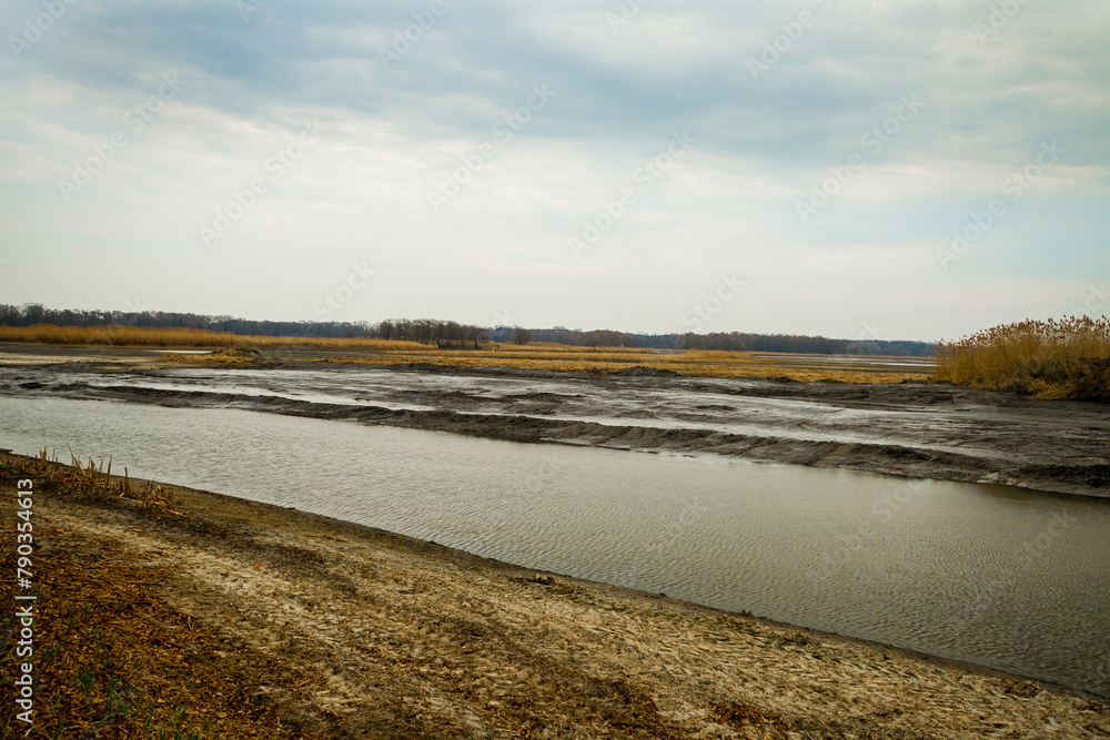 Dried bottom of a lake with mud