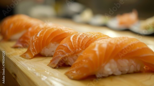 Salmon nigiri sushi: Classic nigiri sushi showcases slices of fresh salmon atop bite-sized mounds of seasoned sushi rice, a timeless favorite.