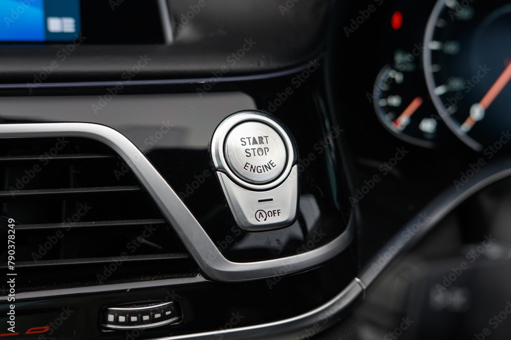 Modern Push Start/Stop Button in Luxury Car Modern Push Start/Stop Button in Luxury Car