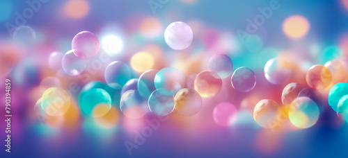 Abstract colorful bokeh background with defocused lights. 