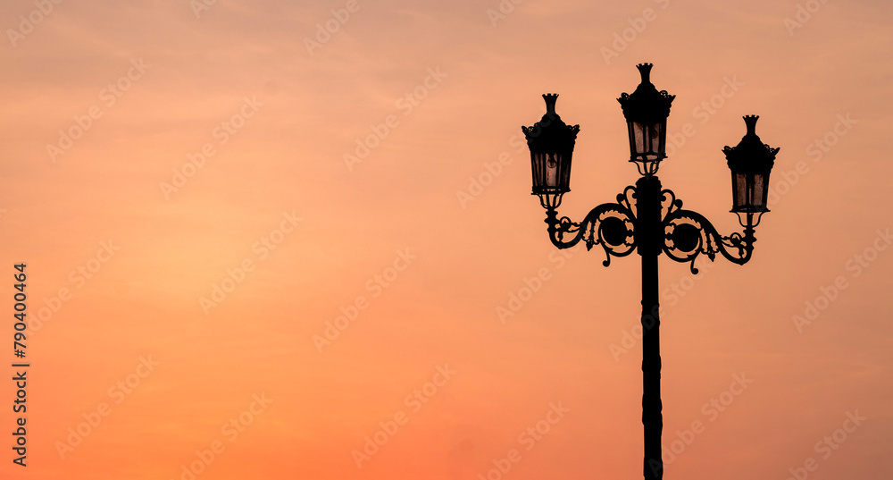 Background image of retro lamp in sunset. Background image of retro lamp in sunset.