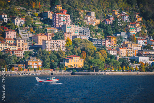 Small airplane landing on the Como lake, Como, Italy