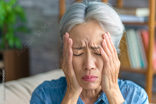 Elderly woman distressed by severe headache