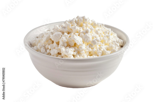 A bowl full of fresh white cottage cheese isolated on a white background.