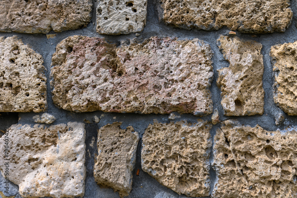 Background of ancient brick wall. Texture of old amphitheater stone. 1 Background of ancient brick wall. Texture of old amphitheater stone. 1