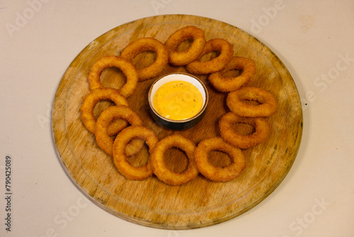 Onion rings Takeaway onion rings with mayonnaise and ketchup. Sogan halkasi photo