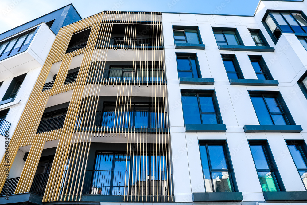 Fototapeta premium Facade of a modern condominium with clean lines