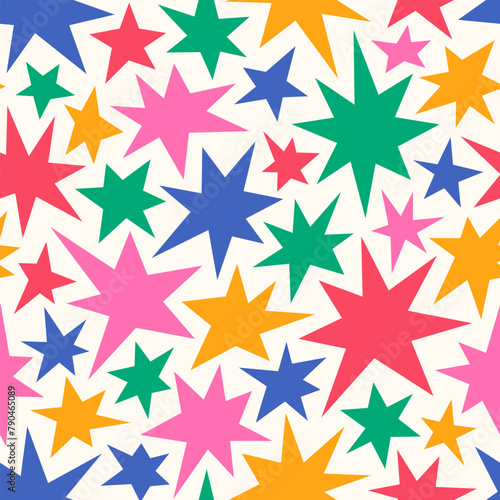 Vivid playful seamless pattern of hand drawn various colorful funny stars and sparks shapes. Cute cartoon childish texture, wrapping paper, textile design. © fireflamenco