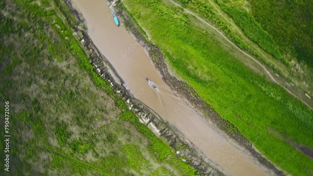 Navigating the Amazon: A Boat's Journey Along a Jungle River in Leticia Navigating the Amazon: A Boat's Journey Along a Jungle River in Leticia