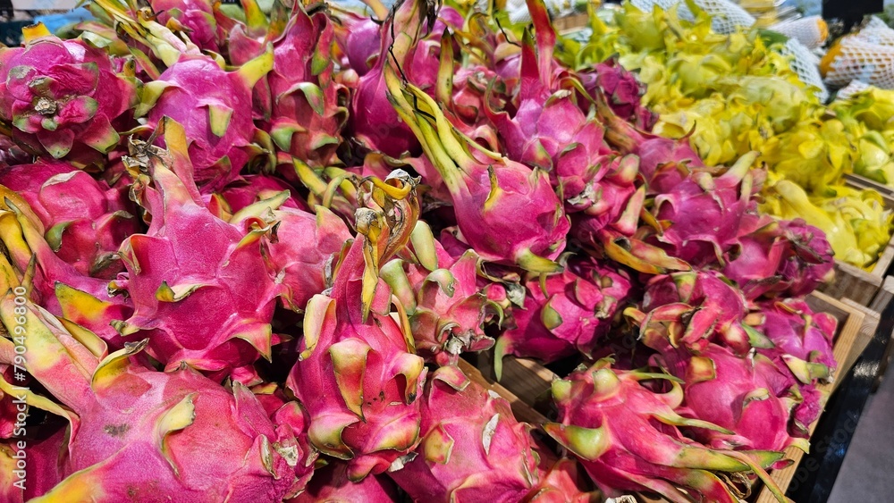 dragon fruits displayed in supermarkets, yellow dragon fruits, tropical, 