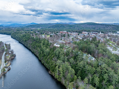 Spring aerial photo of Hanover, NH and Connecticut River on a partly cloudy day.