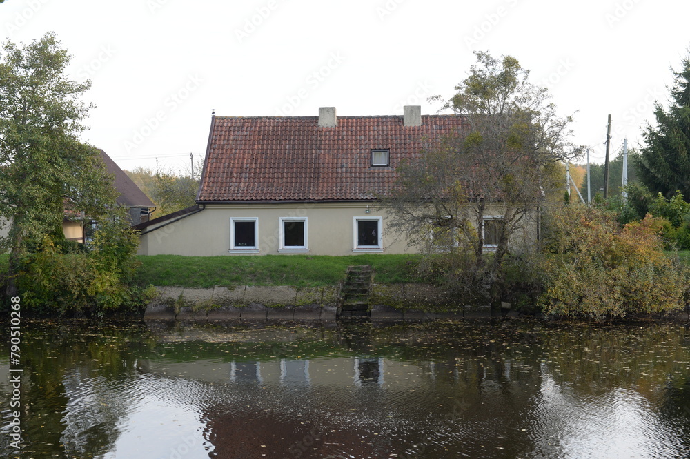 House on the bank of the Polessky Canal in the Kaliningrad region House on the bank of the Polessky Canal in the Kaliningrad region