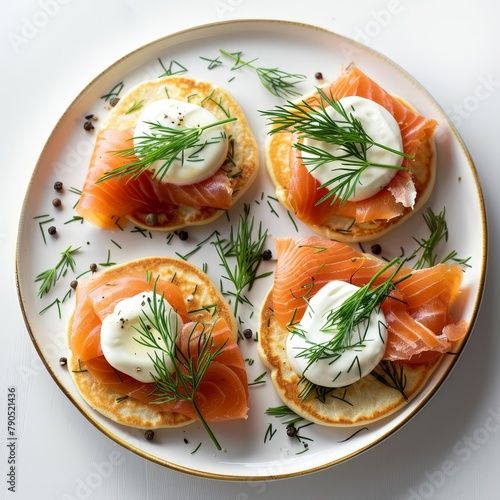 Elegant smoked salmon blinis with cr?me fra?che and dill