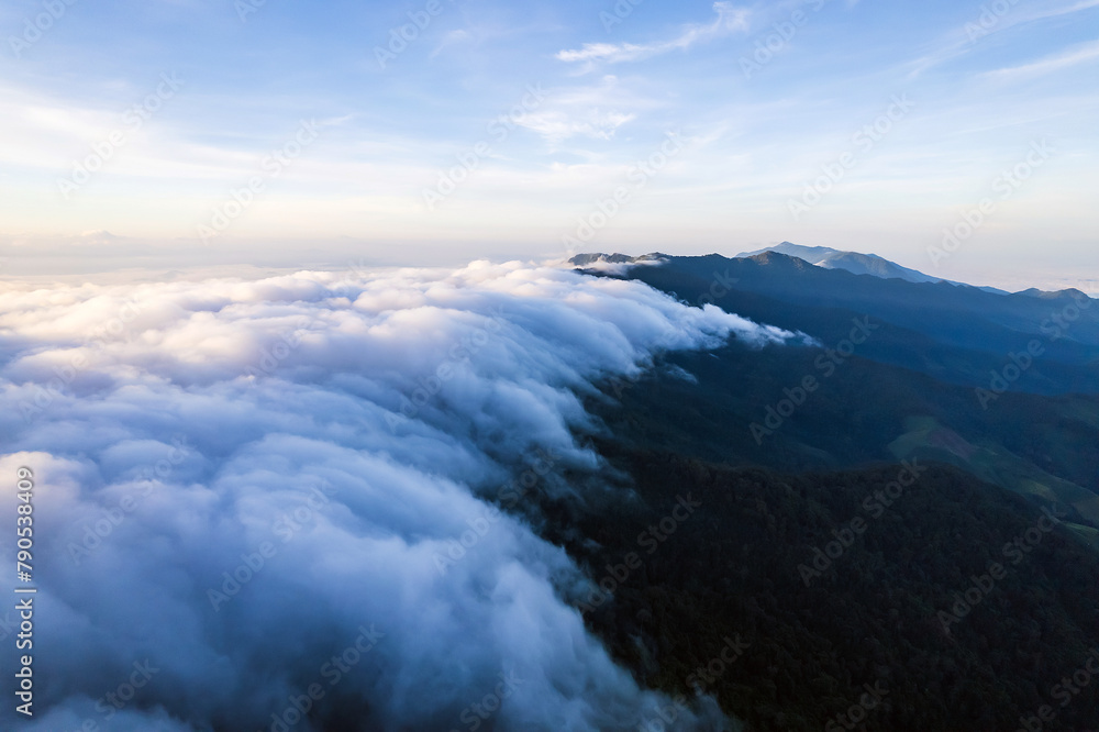 Beautiful sunlight over the mountain and misty of Thailand