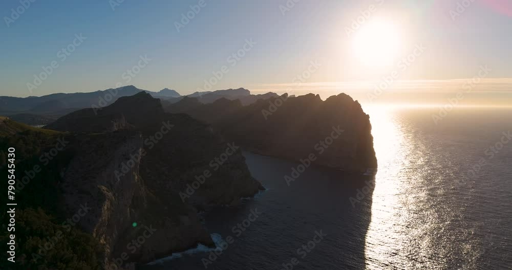 sunset at the cap fermentor at Mallorca with the cliff in the back sunset at the cap fermentor at Mallorca with the cliff in the back