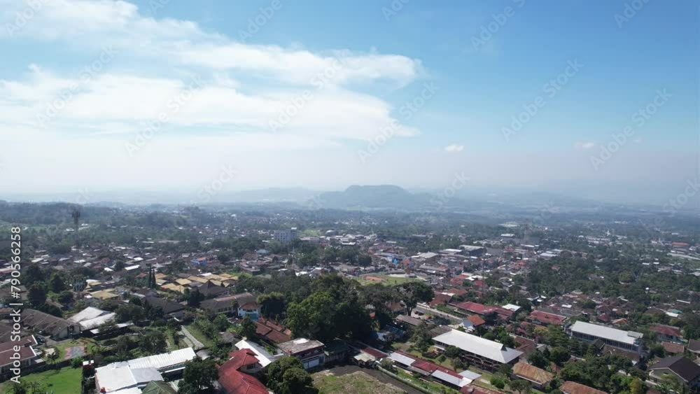 aerial view of a city in Indonesia in the morning with a clear sky aerial view of a city in Indonesia in the morning with a clear sky