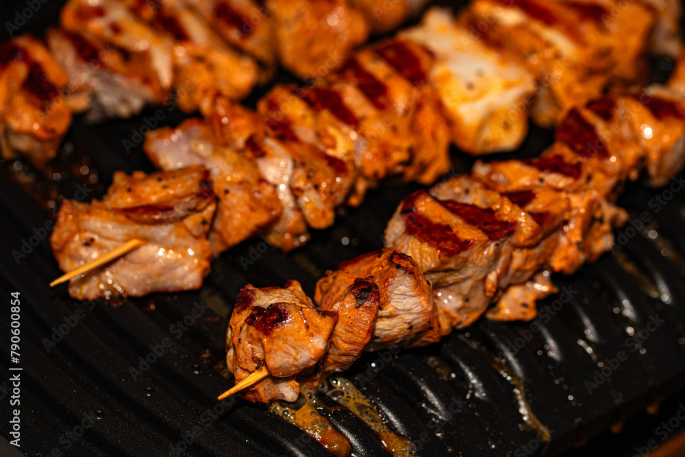 Closeup of meat prepared on electric grill Closeup of meat prepared on electric grill