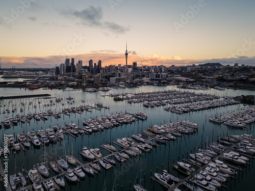 Auckland, New Zealand: Aerial of the Auckland downtown district skyline with the Westhaven Marina at sunset in New Zealand largest city.
