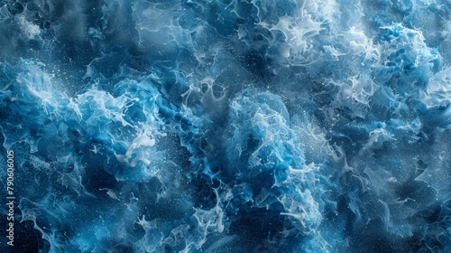  A tight shot of a blue-black dual-toned backdrop, featuring water in turbulent motion at the top and bottom edges