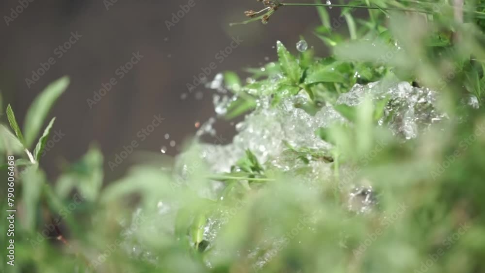 the coolness of the water flowing from the shower the coolness of the water flowing from the shower