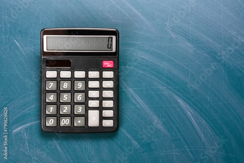 School calculator on blue chalk divorce board.