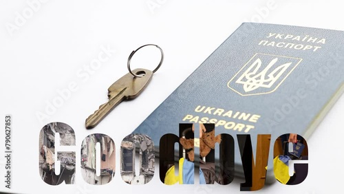 The hand placed the house key next to the Ukrainian passport and in the background the text goodbye, leave the house because of the war photo