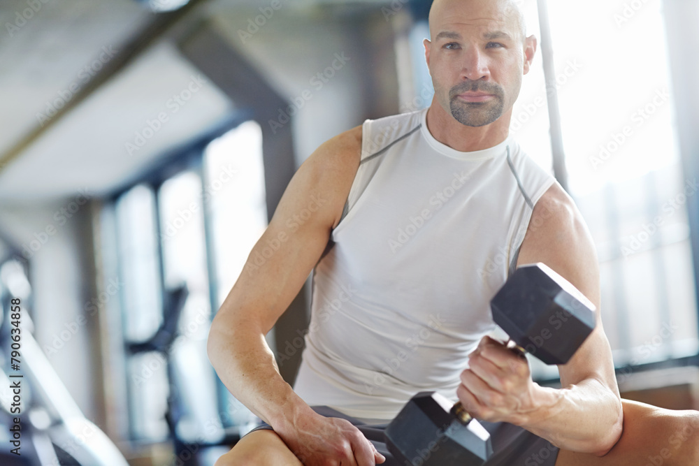 Man, weight lifting and exercise in gym for strength with dumbbell, workout challenge and strong muscle. Bodybuilder, pro athlete and fitness training for bodybuilding routine and bicep power Man, weight lifting and exercise in gym for strength with dumbbell, workout challenge and strong muscle. Bodybuilder, pro athlete and fitness training for bodybuilding routine and bicep power