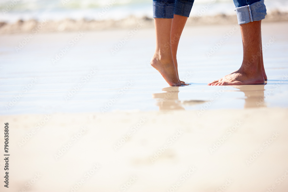 Couple, feet and hug on sand at beach with romance, anniversary date and honeymoon travel on mockup space. People, legs and embrace with jeans, relax and bonding by ocean for summer holiday in Bali