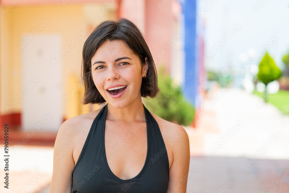 Young pretty Bulgarian woman at outdoors with surprise facial expression Young pretty Bulgarian woman at outdoors with surprise facial expression