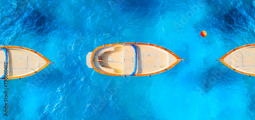 Drone view of a motor boat. Luxury transportation. Vacation and holidays. Summer time for sea travel. The sea bay. Photo for background and wallpaper. Mediterranean Sea.