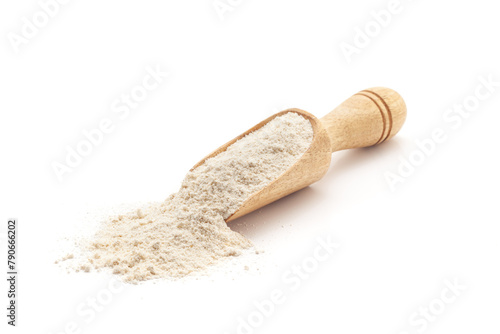 Front view of a wooden scoop filled with Organic Sorghum Flour (Sorghum bicolor) or Jowar Flour. Isolated on a white background.