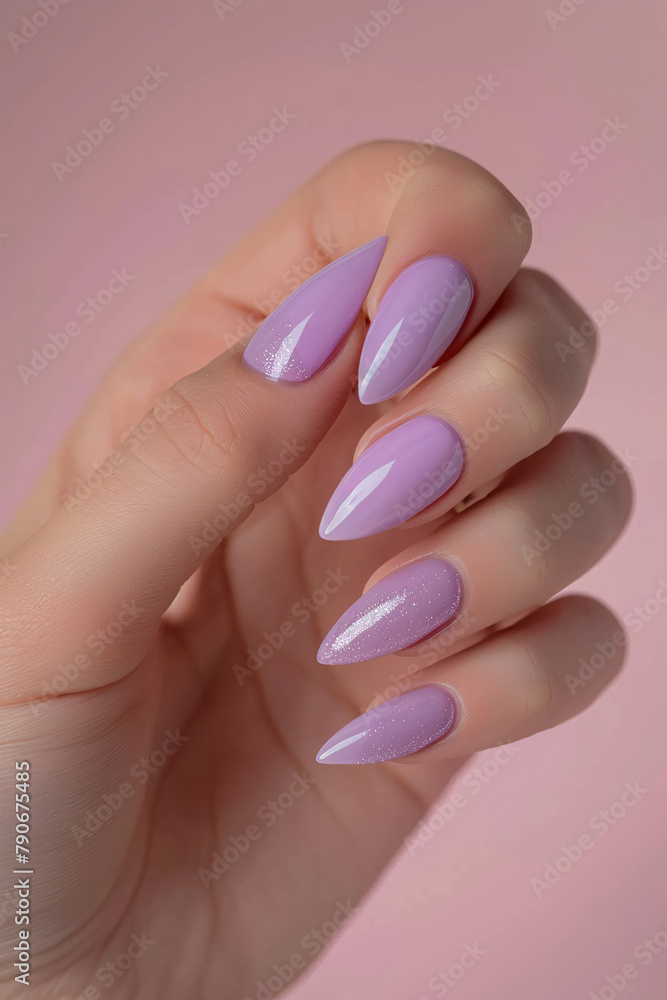 Professional hand model showcasing elegant lavender nails with a shimmering finish against a soft pastel backdrop Professional hand model showcasing elegant lavender nails with a shimmering finish against a soft pastel backdrop