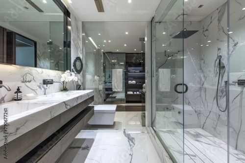 A chic marble bathroom featuring a large walk-in shower situated next to a sink