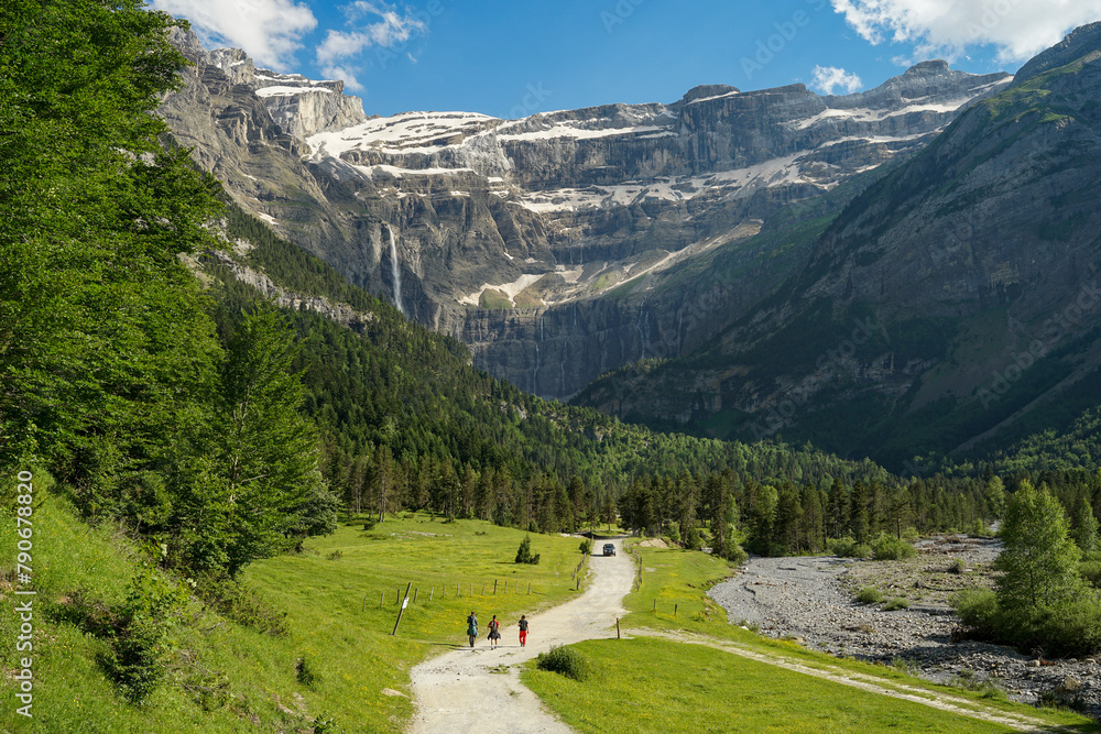 Hiking trail to Gavarnie Falls, spectacular waterfall in french Pyrenees, highest waterfalls in France, popular tourist landmark