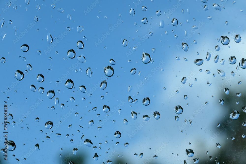 spring rain drops on car glass 1
