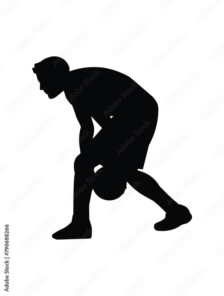 Black silhouette of basketball player who cross the ball to pass it to a teammate during a competition game Black silhouette of basketball player who cross the ball to pass it to a teammate during a competition game