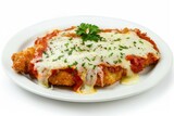 Photo of chicken parmesan on a white plate, isolated against a studio background.
