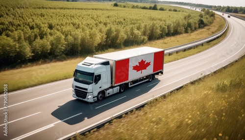 An Canada-flagged truck hauls cargo along the highway, embodying the essence of logistics and transportation in the Canada