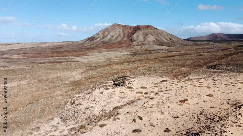 Volcano seen from above in desertic zone, brown colors