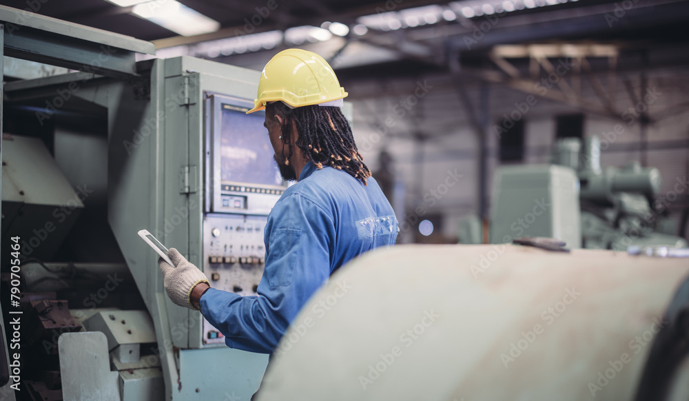 Technician adjusts and troubleshoots factory machinery for optimal performance and safety standard Technician adjusts and troubleshoots factory machinery for optimal performance and safety standard