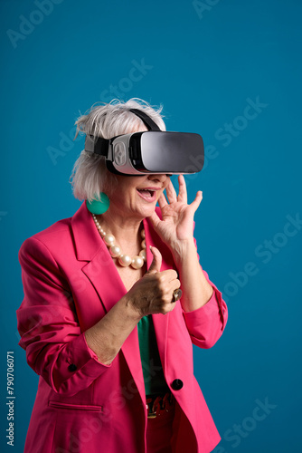 senior woman thrilled by vr technology - thumbs up