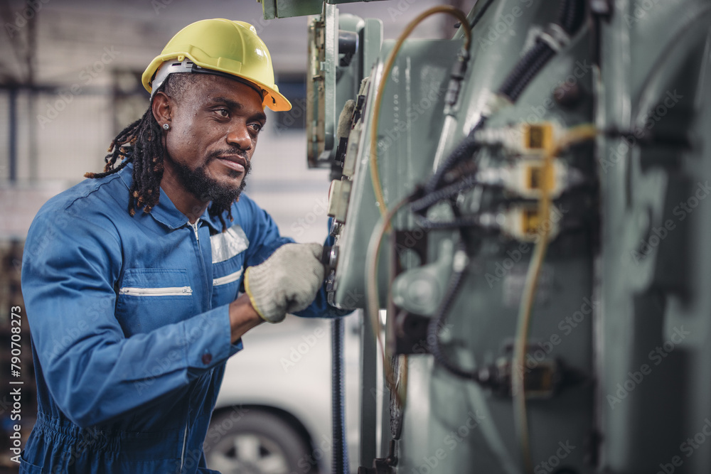 Technician adjusts and troubleshoots factory machinery for optimal performance and safety standard Technician adjusts and troubleshoots factory machinery for optimal performance and safety standard