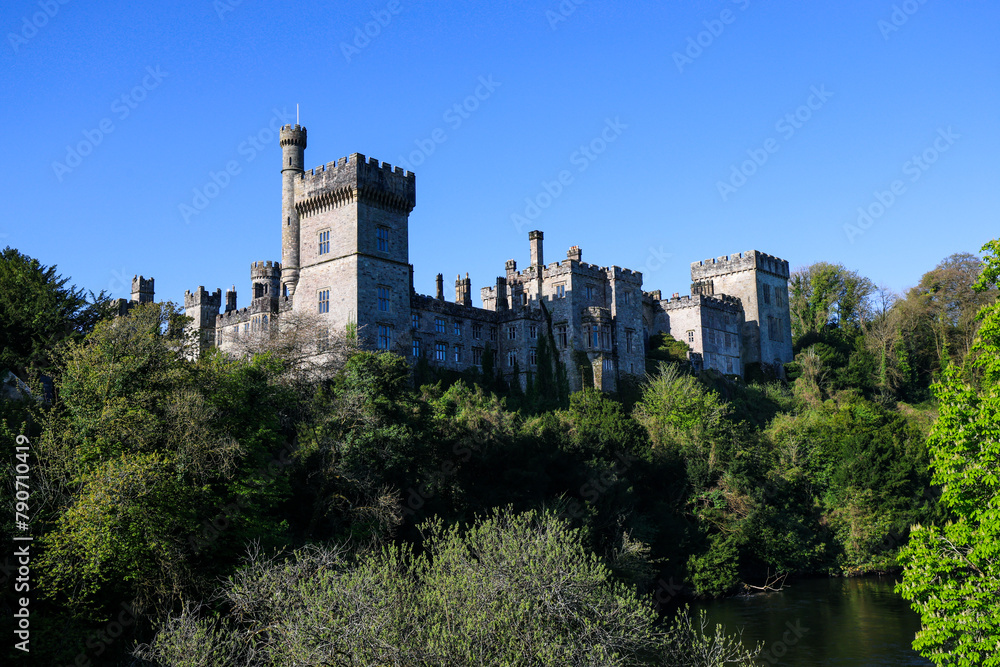 Lismore Castle, County Waterford, Ireland, on a tranquil spring day under a flawless blue sky