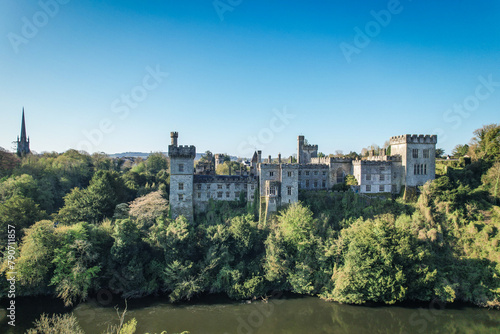 Aerial view of Lismore Castle  County Waterford  Ireland  on a tranquil spring day under a flawless blue sky