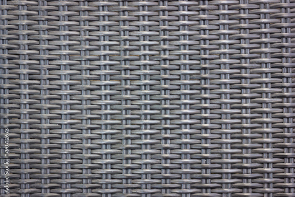 Texture of chair made from woven plastic or ratan for background 