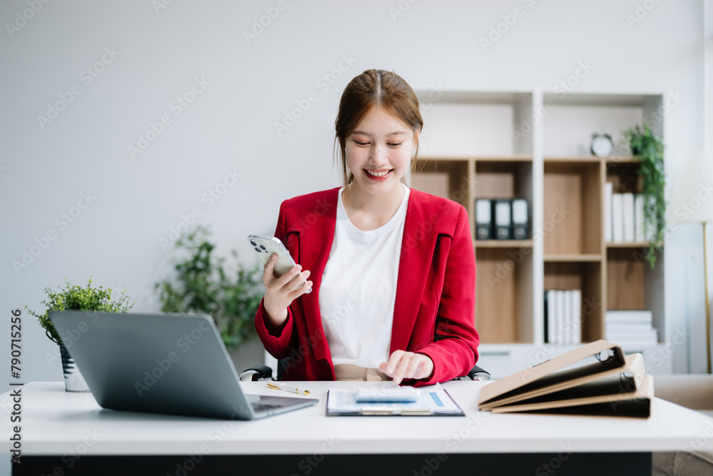 Business woman using tablet and laptop for doing math finance on an office desk, tax Business woman using tablet and laptop for doing math finance on an office desk, tax